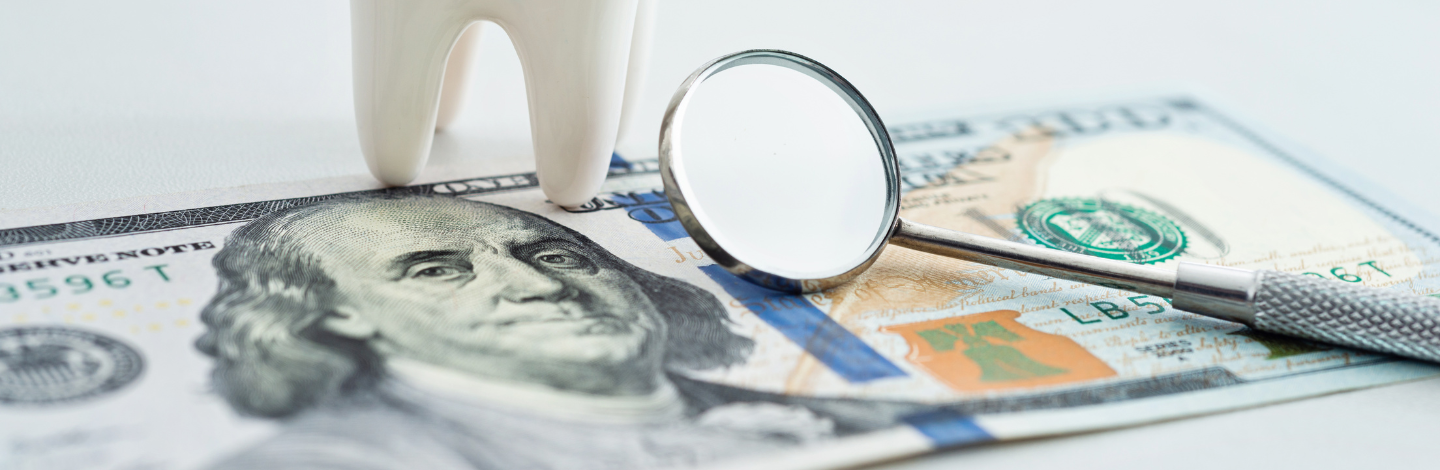 dental tools with $100 bill