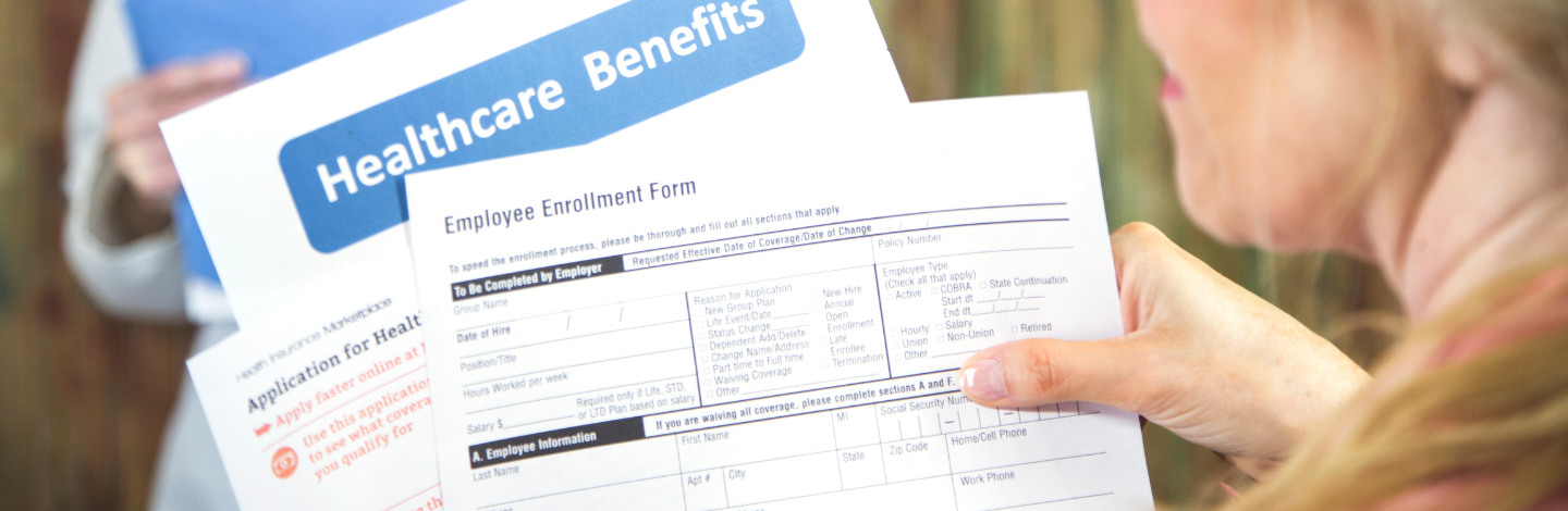 Documents showing health insurance signup forms