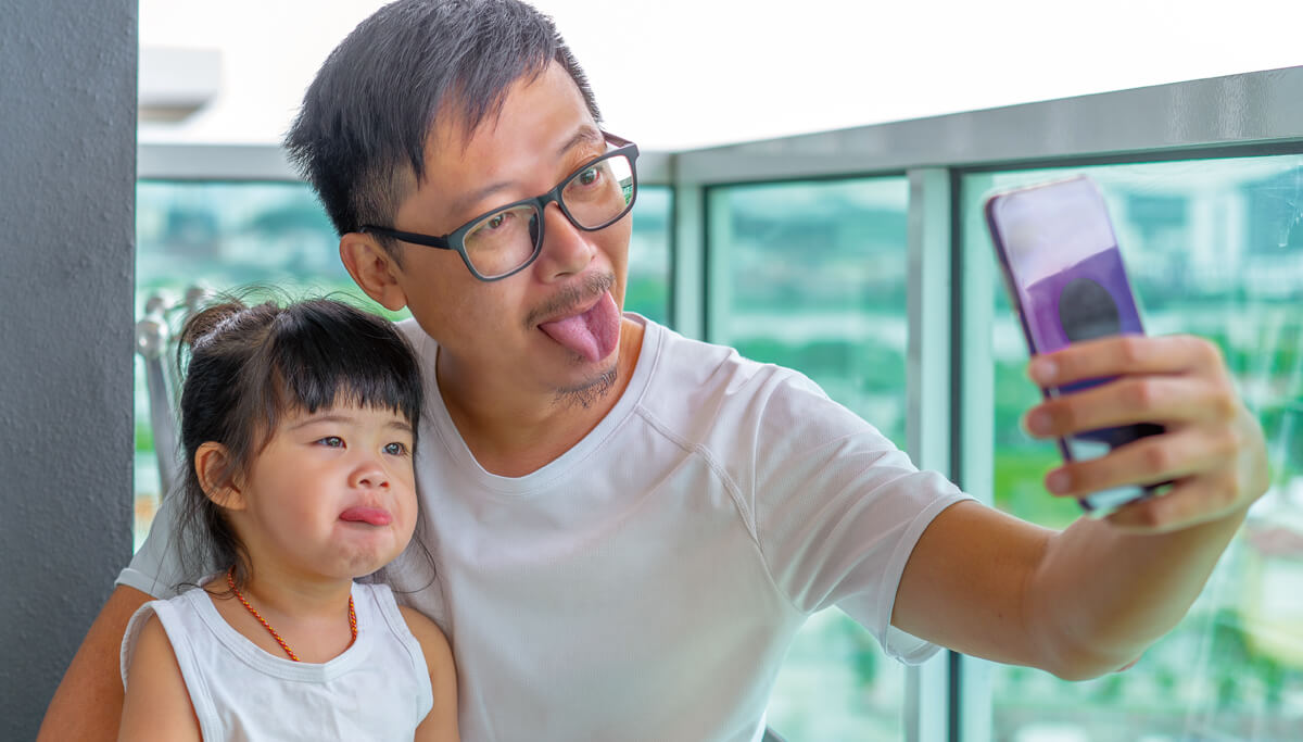 father-sticking-out-tongue-1200x683