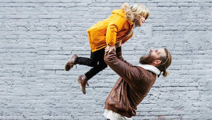 man-holding-child-1200x683