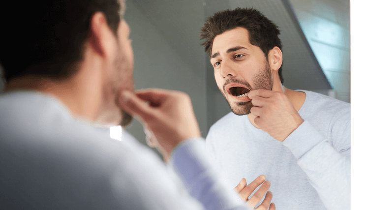 man-looking-at-teeth-1200x683 man-looking-at-teeth-1200x683