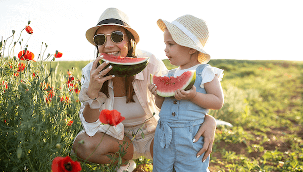 mother-daughter-eating-watermelon-1200x683