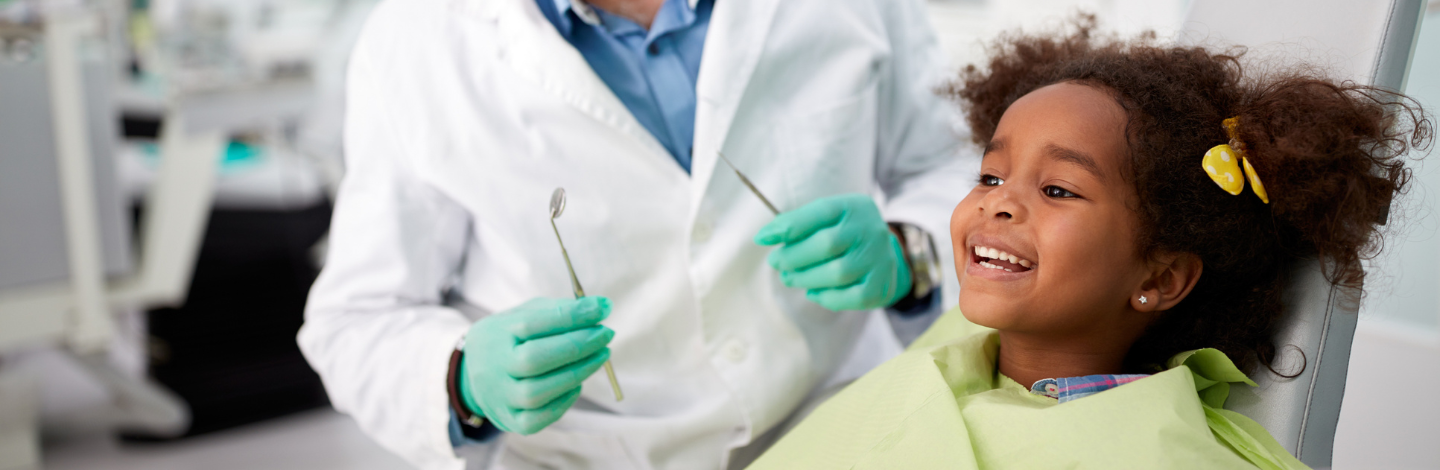 Child smiling at dentist