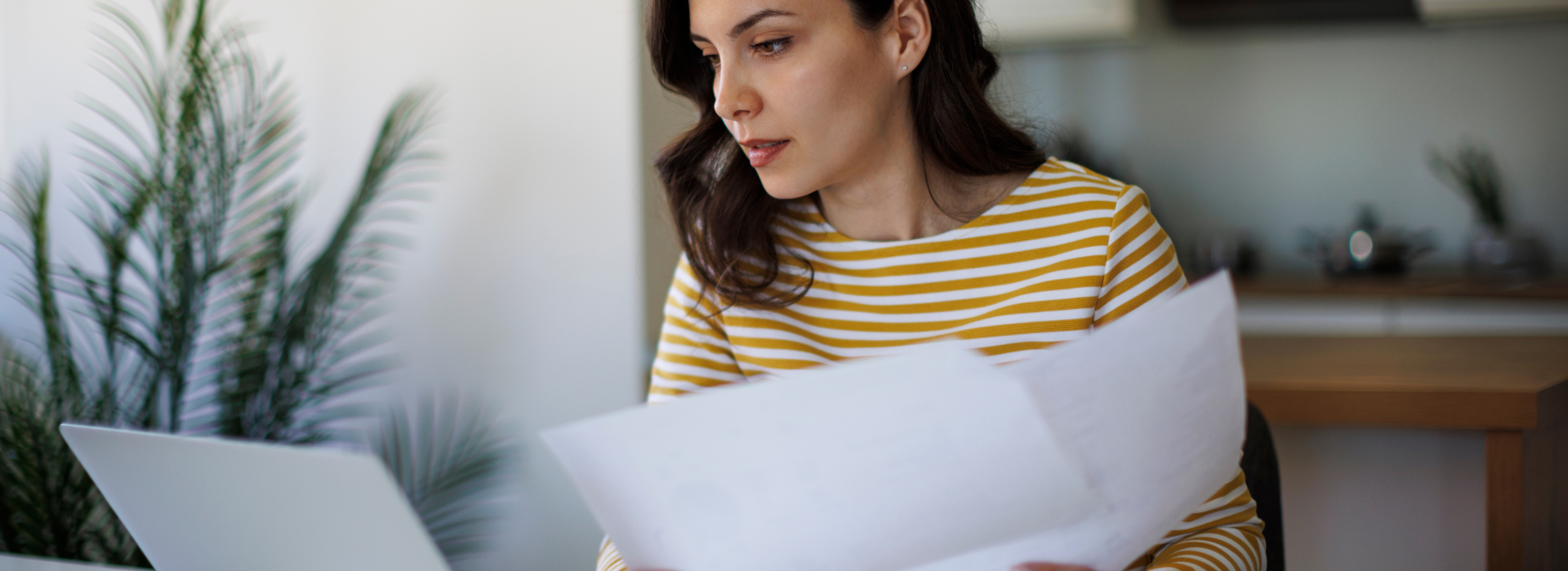 woman looking through papers