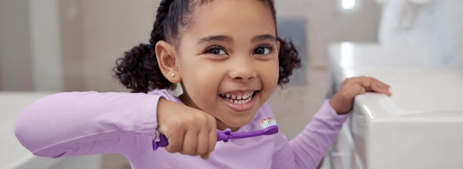 girl with tooth brush