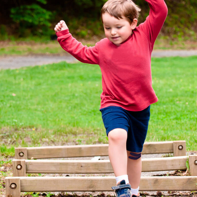 young-boy-playing-outside-800x800